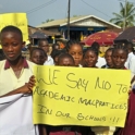 A Group Of Integrity Club Members Outside During A Public Awareness Campaign With Banner That Says We Say No To Academic Malpractice