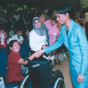 Carla shakes the hand of former Secretary of State Condoleezza Rice in 2005. 