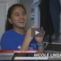 A screenshot from a news clip on Nicole