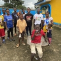 Alumna And Volunteers Posing As A Group