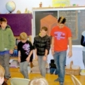 Mahmoud Teaching A Dance To Students In A Classroom