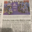 Photo Of Newspaper Clipping Featuring Robotics Team