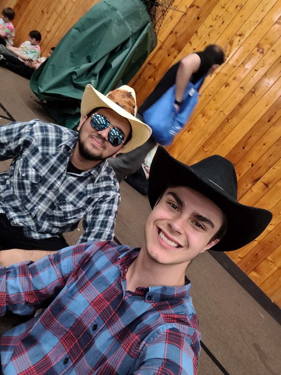 Azhab and his friend dressed up for a square dancing event at the camp.  Jpeg 1