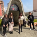 Five people stand in front of the Bunk'Art entrance