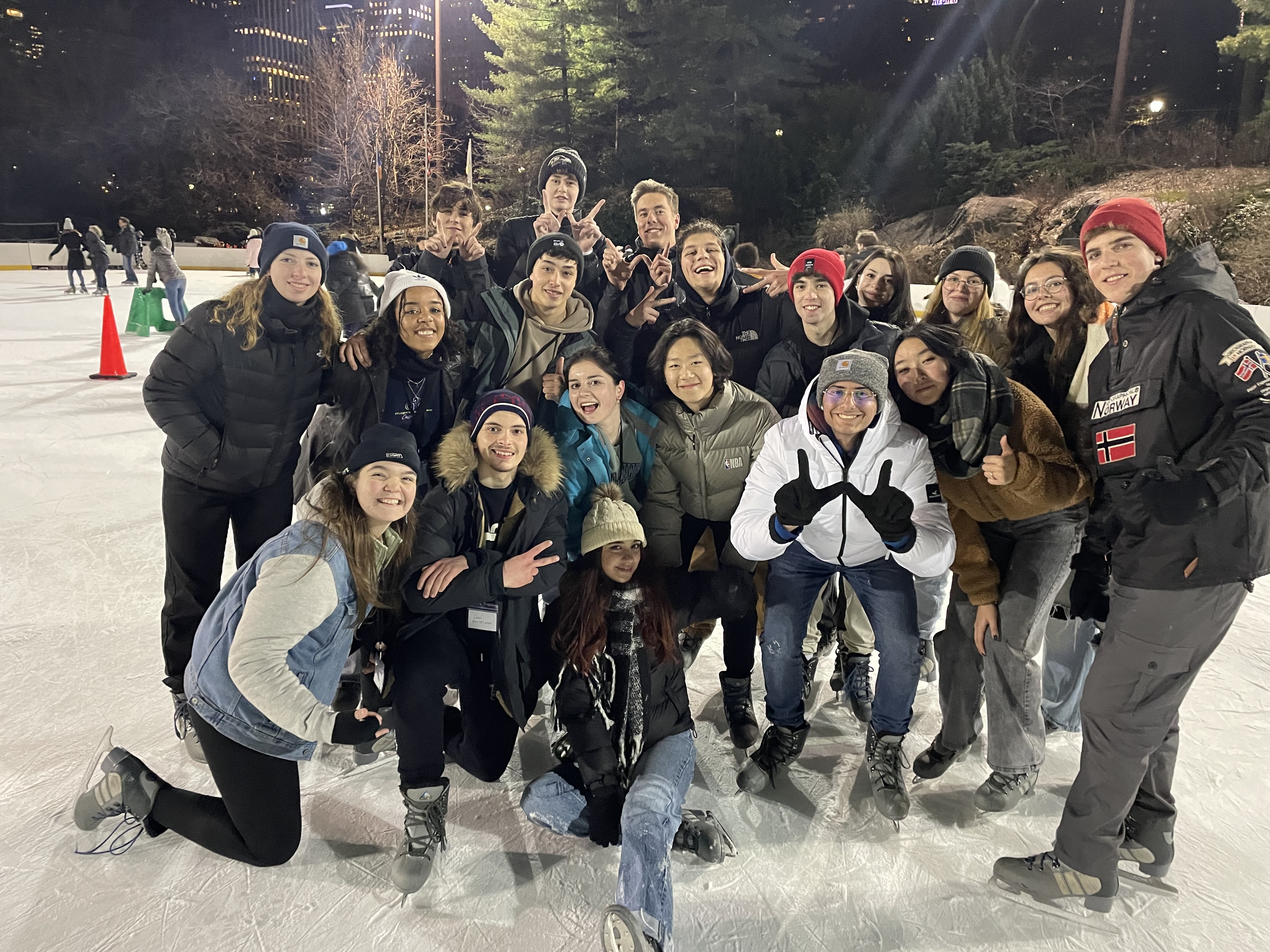 A Group Of Young People On An Ice Rink