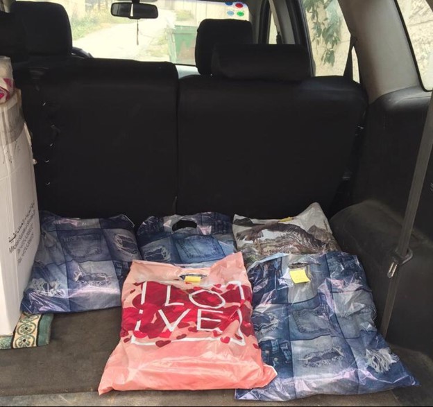 Donations for the Ramadan donation drive in the back of a car