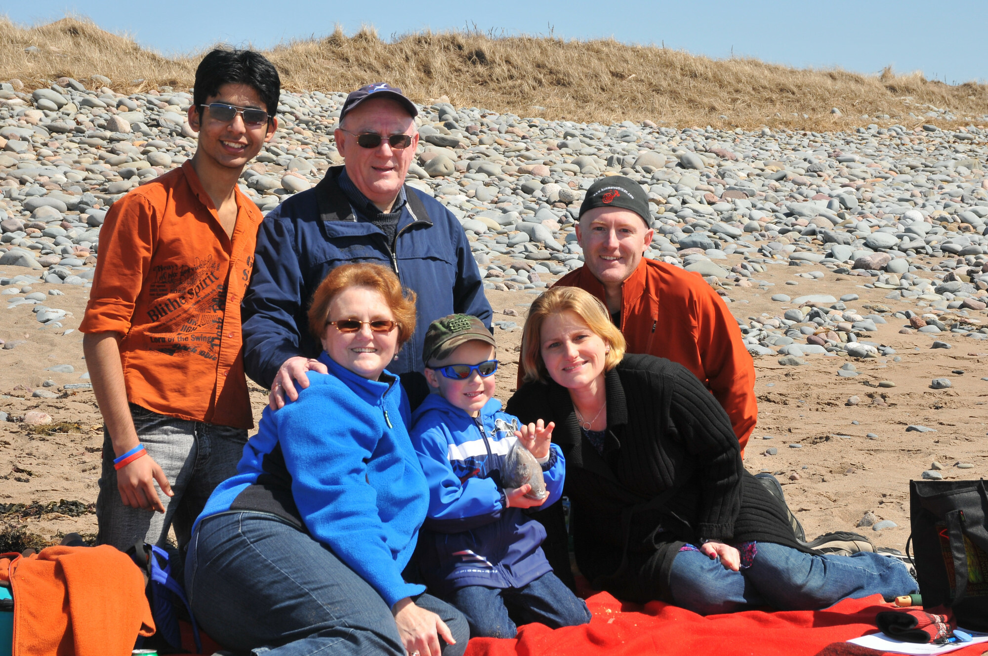 Alum Posing With Extended Host Family In Nova Scotia
