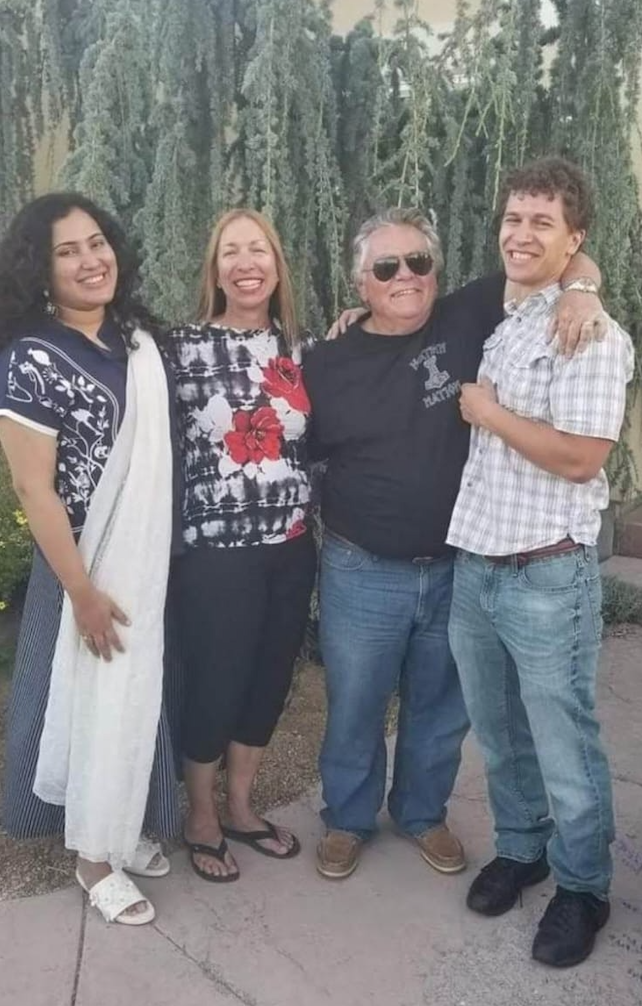Aluma Posing With Host Family