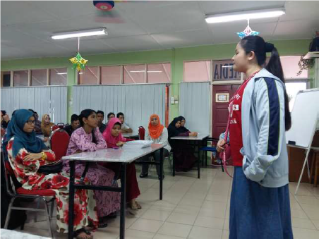 Celine speaking to a classroom of prospective YES students in Malaysia