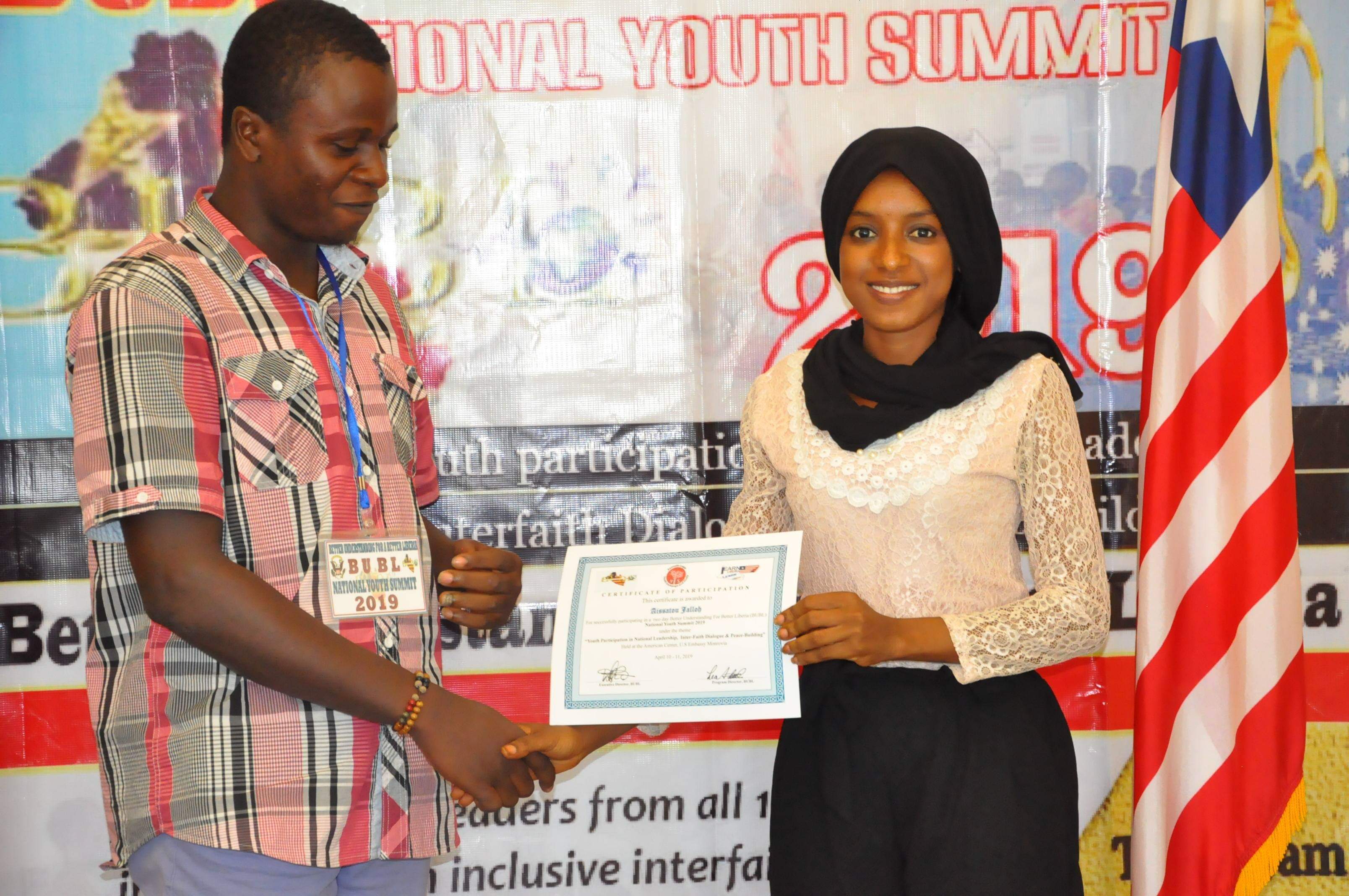 Miss Aissatou Diallo Awarding A Certificate
