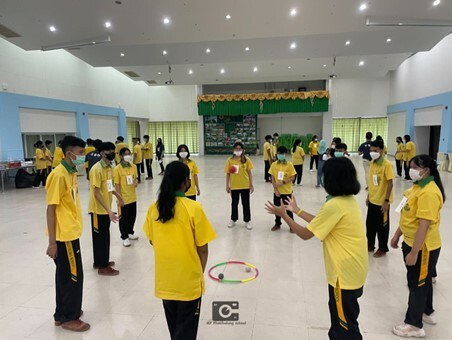 People Are In A Circle Engaging In A Workshop Activity In Thailand