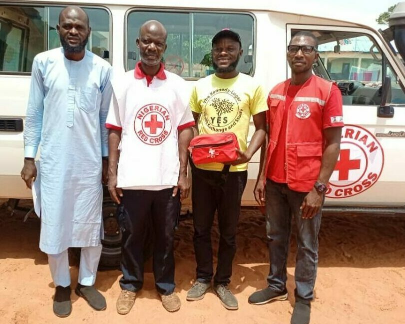 Red Cross representatives donate First Aid box to be distributed to schools that participated