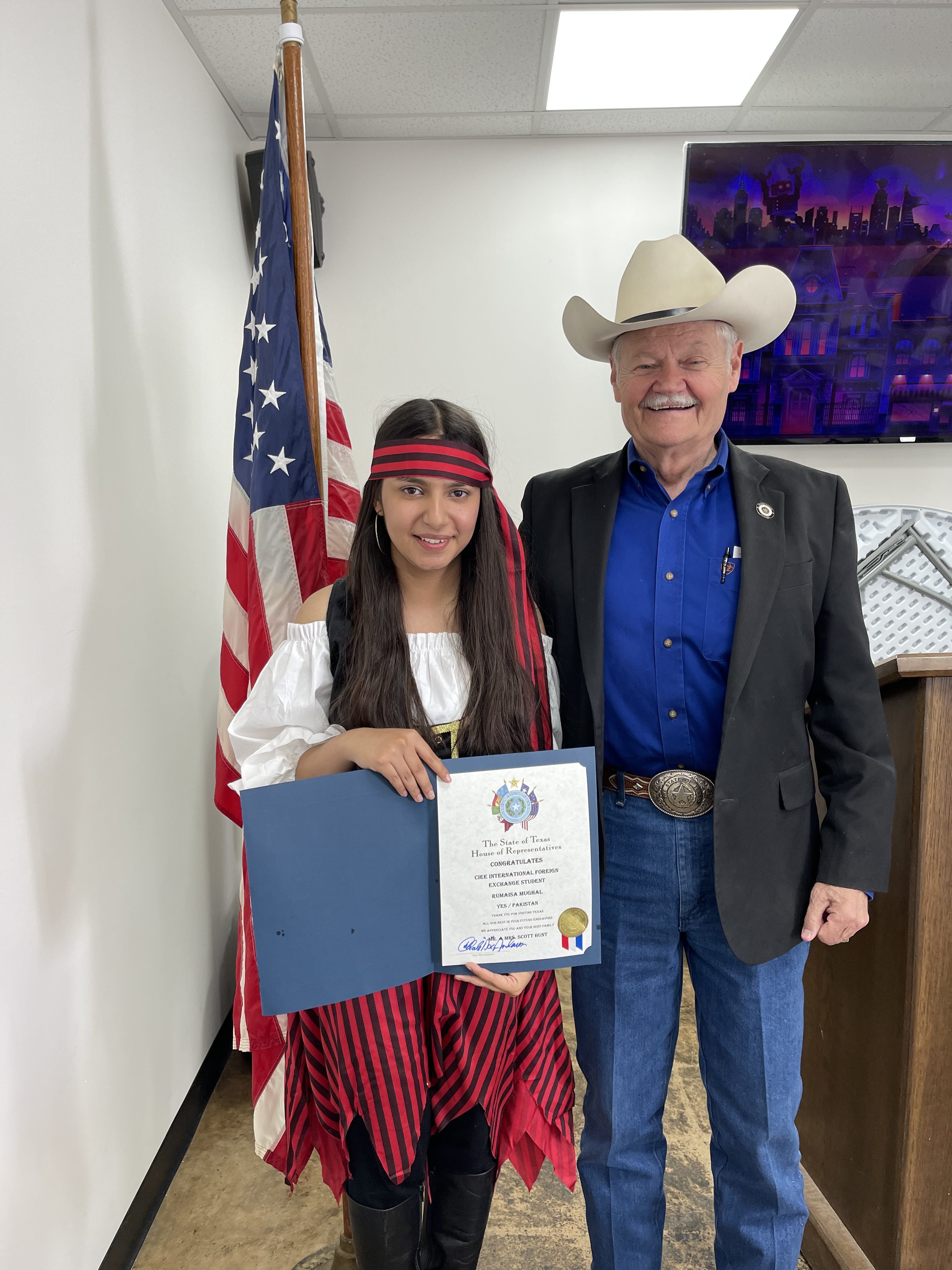 Rumaisa Receiving A Certificate Of Achievement From Texas State Rep  Charles Doc Anderson