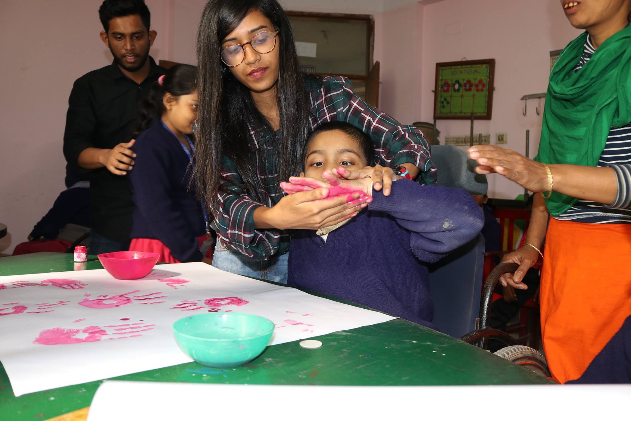 Shomy leading WASH activities with young children