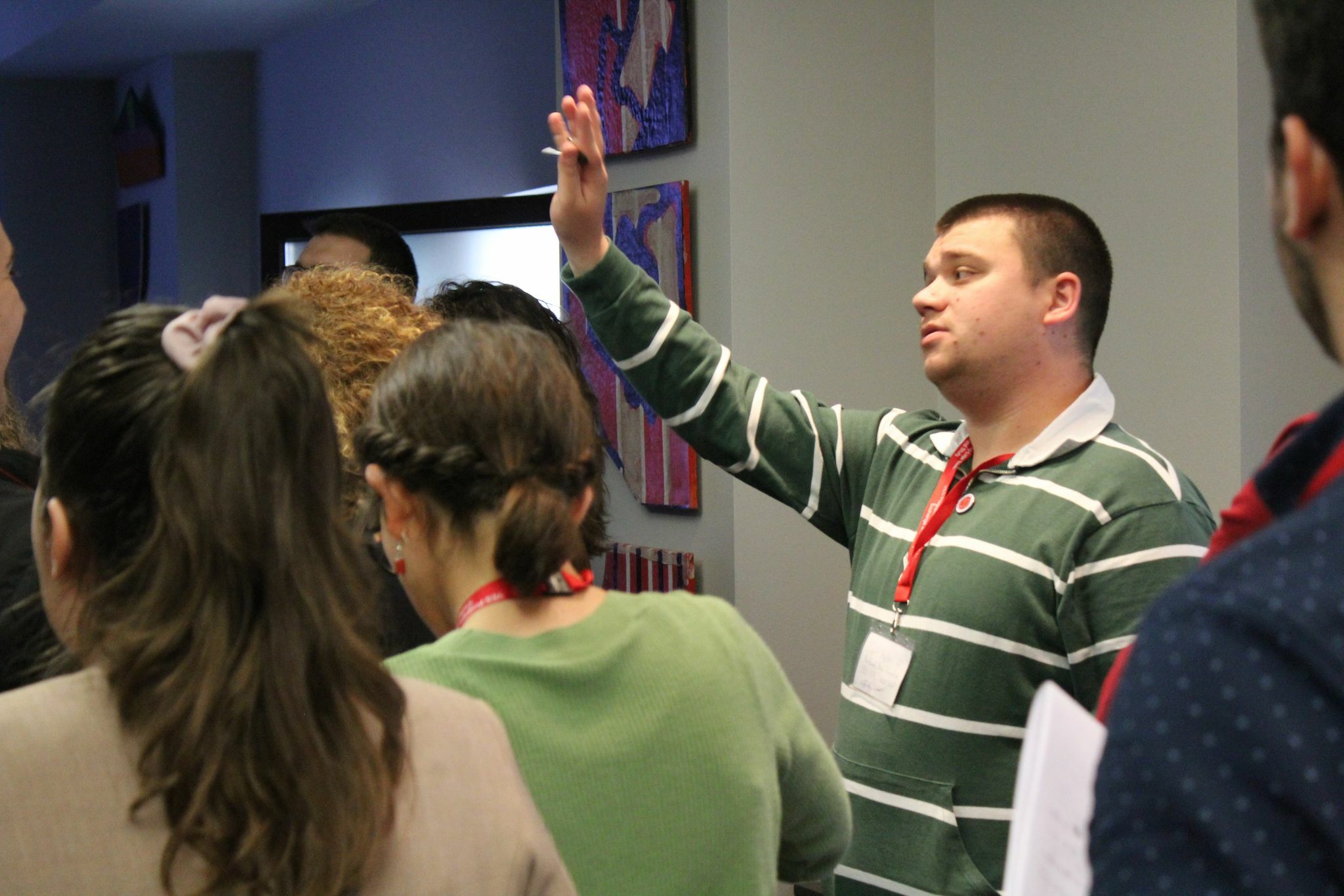 Student Raises Their Hand In Workshop