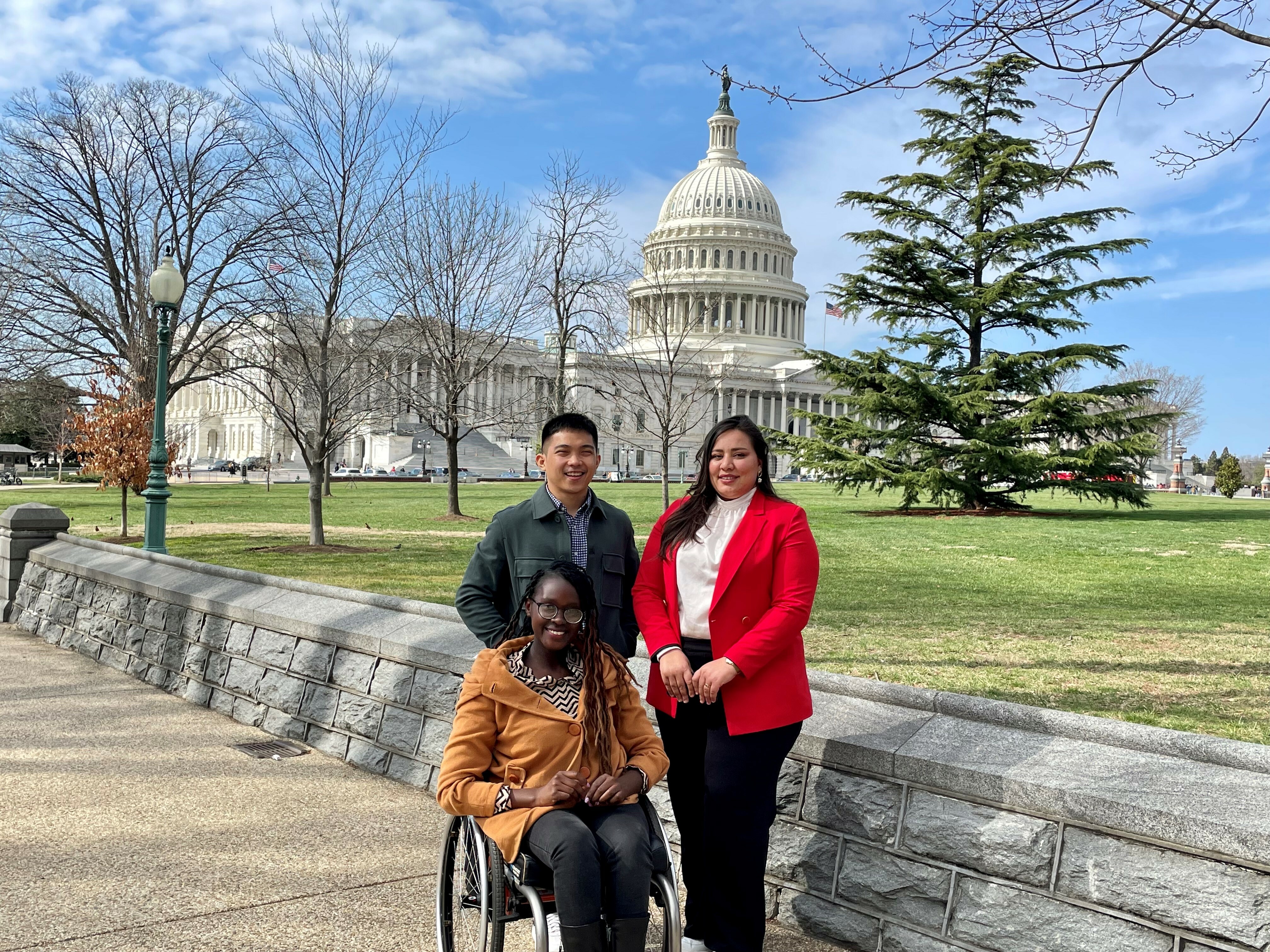 Three 2023 Civic Education Alumni Mentors Pose In Front Of The Capitol Building