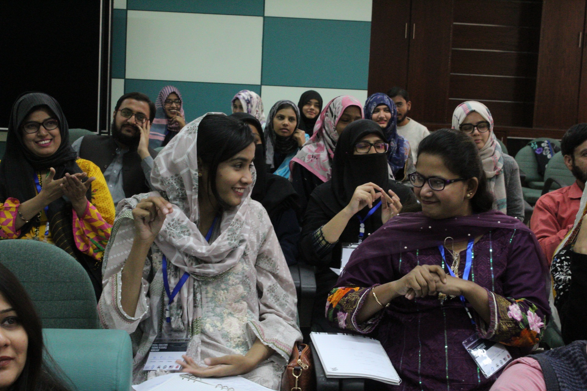 Tariq Participants Practicing Communicating In Pakistani Sign Language