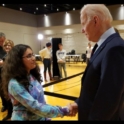 YES student shaking Joe Biden's hand on a Basketball court 