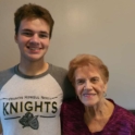 YES student standing next to his host grandma, smiling