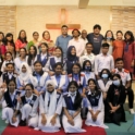A Group Poses For A Photo At A Church After An Interfaith Seminar
