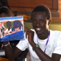 A participant showing off an elephant painting JPG