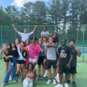 Ajwan and her tennis team on the tennis court