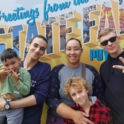 Ali And His Host Family In Front Of The State Fair Sign