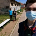 YES alum, Edna, taking a selfie with two volunteers during GYSD clean-up project