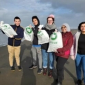 Saged Ahmed at a Beach Clean Up event with other youth