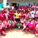 Group photo with participants showing the word LOVE in sign language