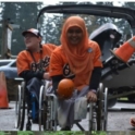 Ina Yuna plays basketball in a wheelchair