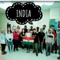 Tushi holding Indian flag with a group of students