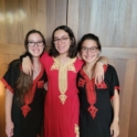 YES student, Ichrak, with her host sisters in traditional Tunisian attire.