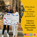 Student posing with host mom and her welcome sign