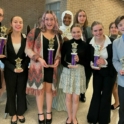 Iva Stand With Club Members Holding Trophies