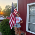 Liliya standing with US Flag