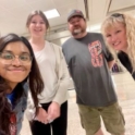 Romasini taking a selfie with her host family on the last day of her exchange experience. 