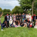 Mahdi and His Students posing on a lawn