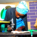 One of the participants working on a sewing machine