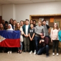 Aniyyah with her Spanish class at school holding the Filipino flag. 