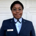 Michelle Cadet wearing a uniform with her name on it