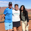 YES student, Shifa standing next to her host parents at monument valley.