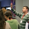 Student Raises Their Hand In Workshop
