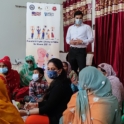 Syed Is Standing Speaking To A Group Of Participants