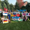 Imge with a group of exchange students from different countries holding their country flag