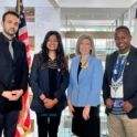 Three 2022 Civic Education Alumni Mentors Pose With Senator Joni Ernst