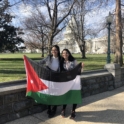 Two Young Women Holding The Jordanian Flag In Front Of The U S  Capitol