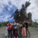 Yes Alumni And Yes Abroad Students Pose In Front Of A Monument