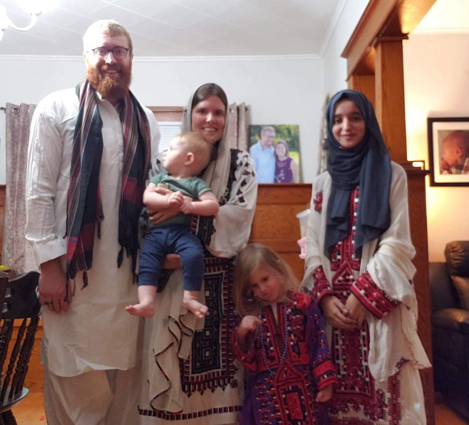 Sahar and her host family wear traditional dresses and clothes from Pakistan. 